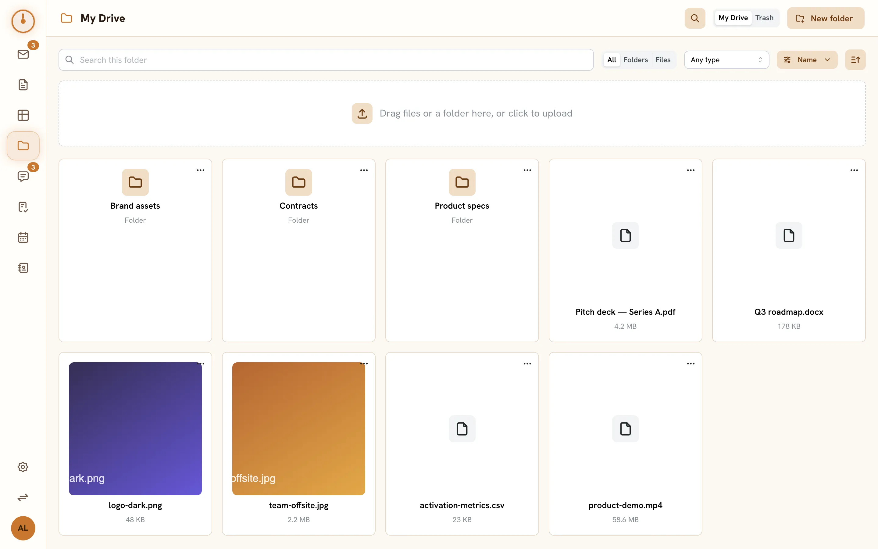 The Drive screen — folders, file cards with previews, and the upload zone